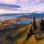 Old Man of Storr with the Black Cuillin Mountains behind. 