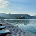 Lakeside decking and loungers at Vila Bled in Slovenia
