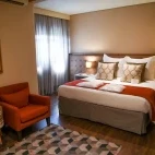 Bedroom at Sanma Hotel in Iguaçu Falls, Brazil