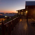 Outdoor decking area at sunset. Boutique Hotel La Cantera in El Calafate, Argentina