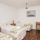 Triple bedroom at Hotel Estancia El Ovejero in Chile