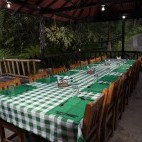 Outdoor dining at Las Tangaras Lodge in Colombia