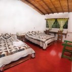 Twin bedroom at Las Tangaras Lodge in Colombia