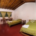 Twin bedroom at Las Tangaras Lodge in Colombia
