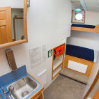 Lower deck twin cabin on board Cachalote Explorer in the Galapagos Islands