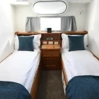 View of the twin bedroom on Heritage Explorer.