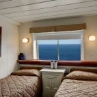 A twin room accommodation option on Wilderness Adventurer.