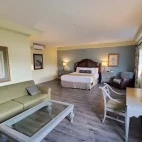 Example of a bedroom with lounge area, at Plantation Resort, Florida.