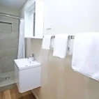 A bathroom with shower, at Chambers Wildlife Lodge, Australia