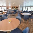 Dining room on board Coral Discoverer ship in Australia