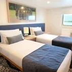 Prom deck twin cabin on board Coral Discoverer ship in Australia