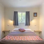 A double bedroom in a cabin at Mount Surprise Discovery Resort, Queensland