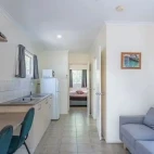 The living room area in a cabin at Mount Surprise Discovery Resort, Queensland