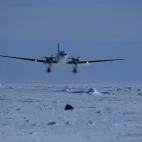 Ski plane landing in Gould Bay, Antarctica.