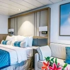 Example of the category C superior room with lounge seating, on Ocean Victory, Antarctica.