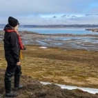Woman on a tundra walk in Svalbard.