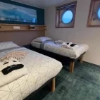 View of a superior suite on the vessel Explorer, Svalbard.