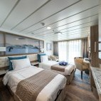 Balcony stateroom C on board Greg Mortimer.