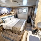 Aurora stateroom on board Greg Mortimer