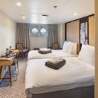 Porthole cabin on board Magellan Explorer.