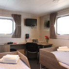 Twin deluxe cabin on board Plancius.