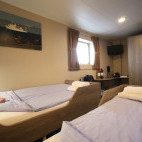 Twin window cabin on board Plancius.