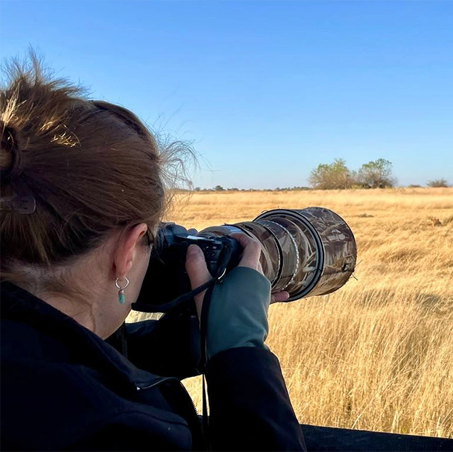 Emma Healey with a mirrorless camera
