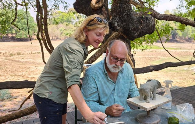 Nick Mackman helping client create elephant sculpture on our South Luangwa Wildlife Art Safari in Zambia