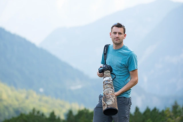 Bret Charman with his DSLR camera in Slovenia