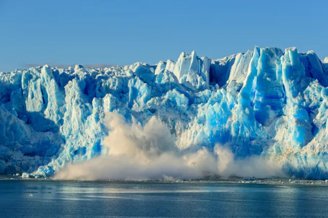 Ice crashing off of the Pio XI Glacier, Chile.